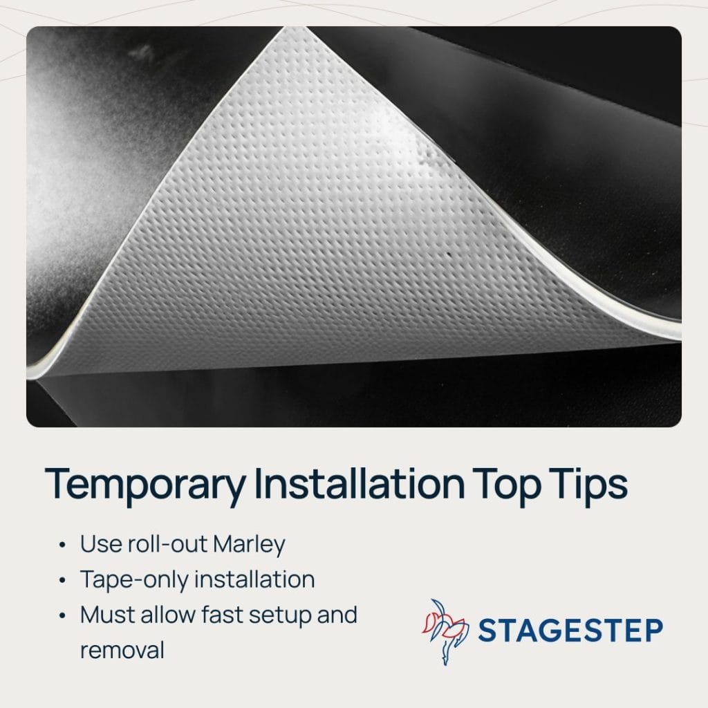 Close-up of roll-out Marley dance flooring being lifted during temporary dance floor installation, showing tape-only installation for fast setup and removal.